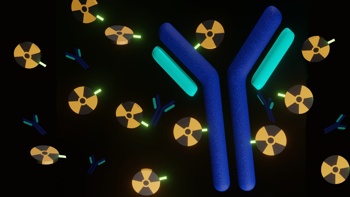 Radioimmuntherapie.jpg Darstellung von Antikörpern in Blau und fluoreszierenden radioaktiven Symbolen auf schwarzem Hintergrund.