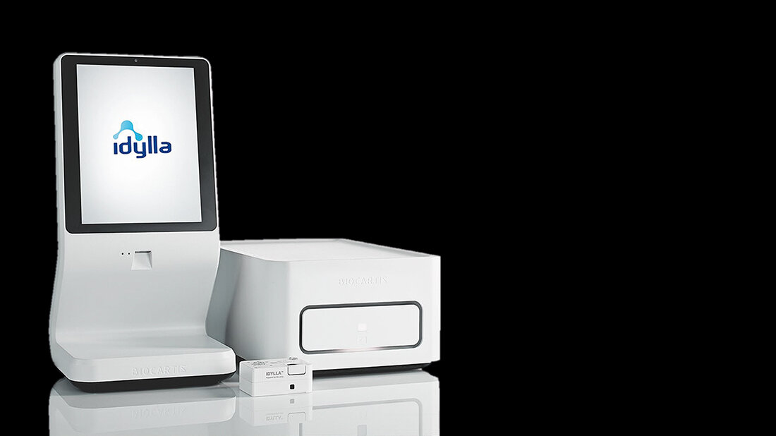 Foto der Idylla™ Konsole und eines Idylla™ Analysemoduls