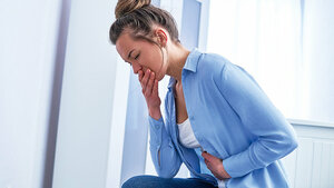 Picture of a woman with digestive problems