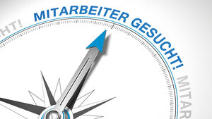 Abbildung eines Kompass, dessen Nadel auf die Formulierung „Mitarbeiter gesucht“ zeigt