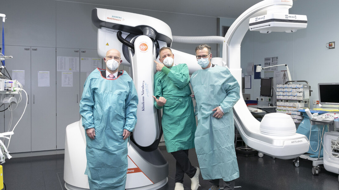 Carsten Bertram (Siemens Healthineers), Prof. Dr. Eric Verhoeven und Prof. Dr. Achim Jockwig (v. l.)