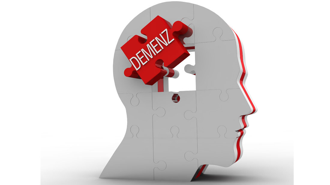 Kopf als Puzzle, bei dem ein Teil fehlt mit der Aufschrift Demenz.