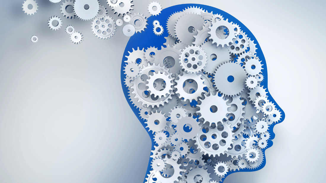 Dieses Bild zeigt eine stilisierte Darstellung eines menschlichen Kopfes, der aus Zahnrädern besteht. 